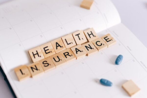Navigating short-term health insurance gaps for freelancers between ACA open enrollment periods. - Featured Image