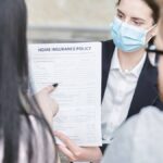 The interplay of workers' compensation insurance and state-specific COVID-19 presumption laws for essential businesses. - Featured Image